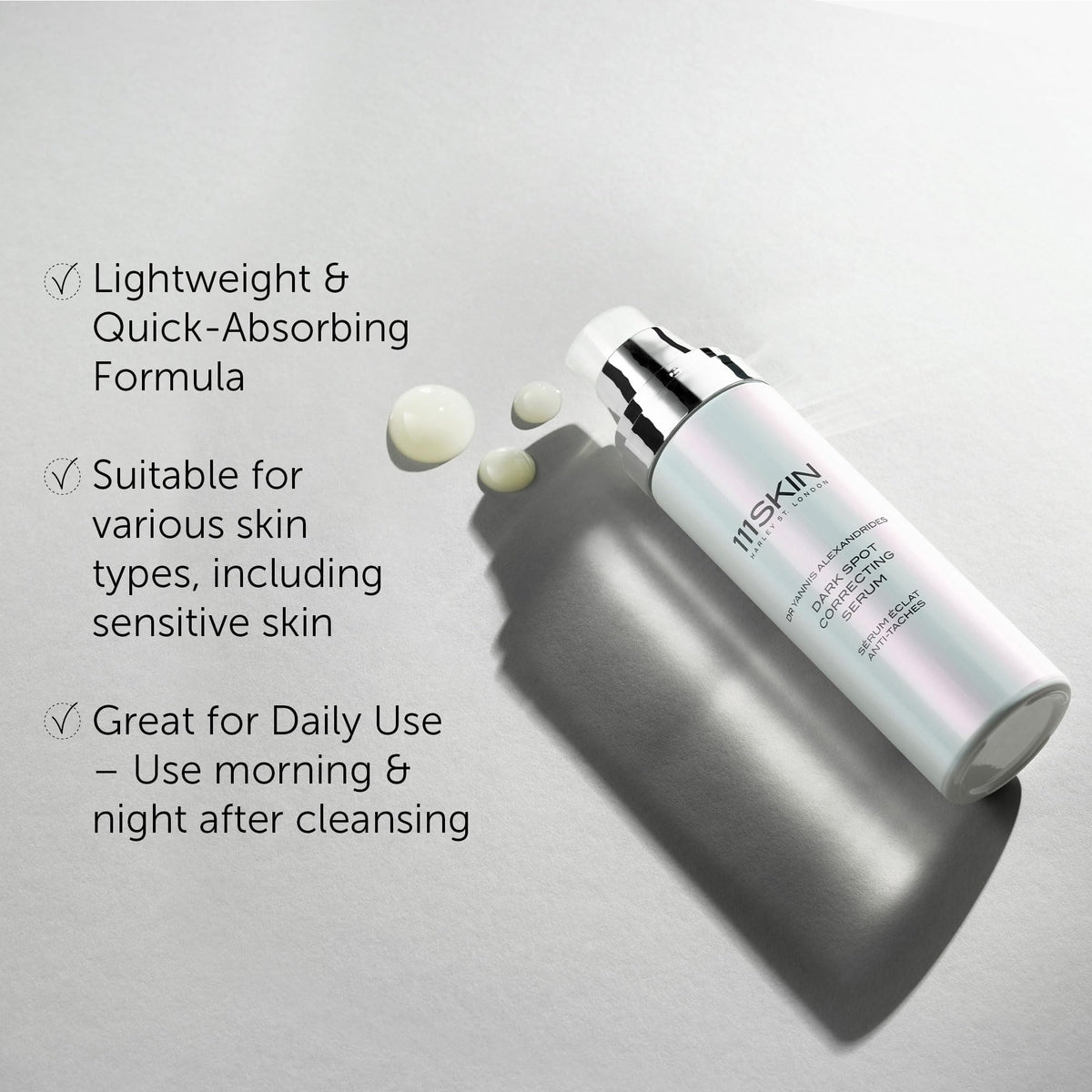 111SKIN Dark Spot Correcting Serum on a marble surface