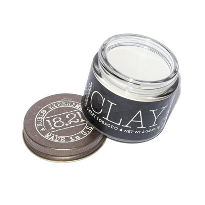 18.21 Man Made Hair Clay 2oz front view with packaging