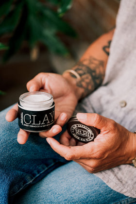 18.21 Man Made Hair Clay 2oz with a comb