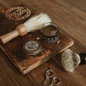 18.21 Man Made Pomade in use for a sleek hairstyle