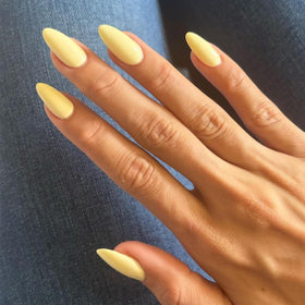 32 pieces of Modelones Yellow Press on Nails in packaging