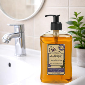 A LA MAISON Lavender Aloe Liquid Hand Soap with ingredients on display