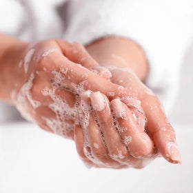 A LA MAISON Rosemary Mint Liquid Hand Soap lifestyle scene in a bathroom