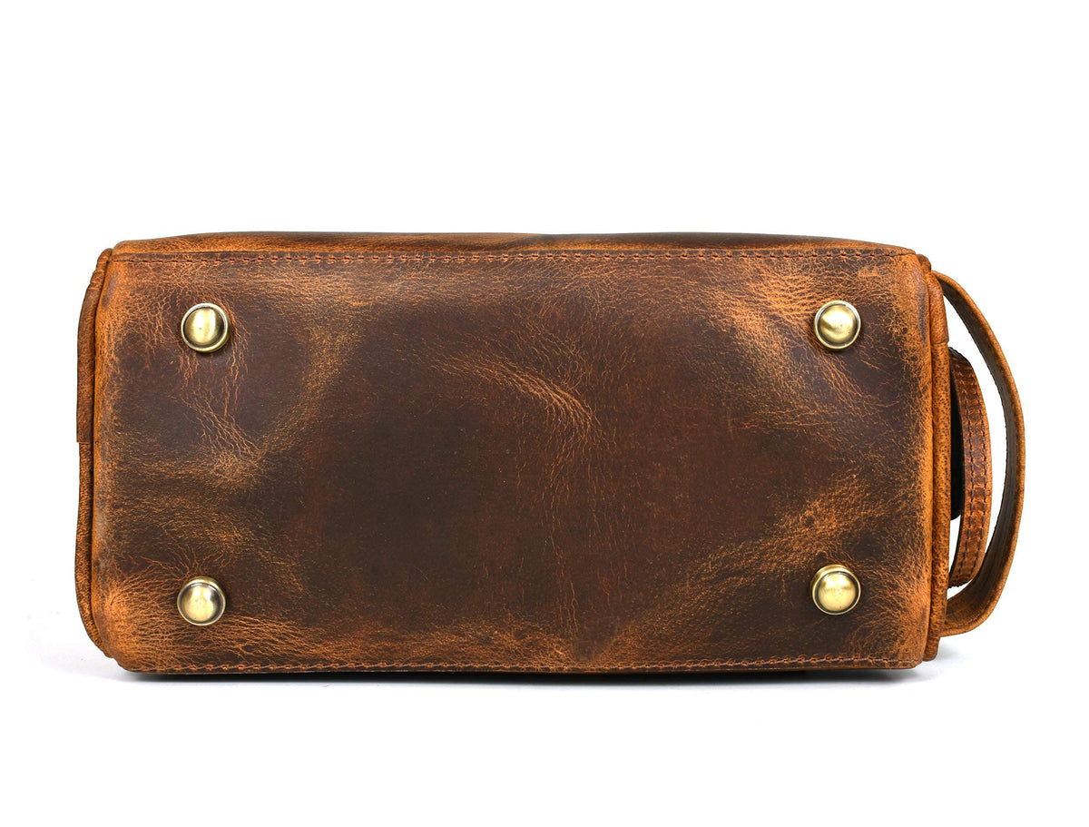 AARON LEATHER GOODS toiletry pouch bottom view with metal studs