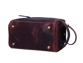 AARON LEATHER GOODS toiletry pouch in travel setting