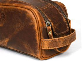 AARON LEATHER GOODS toiletry pouch with leather texture close-up