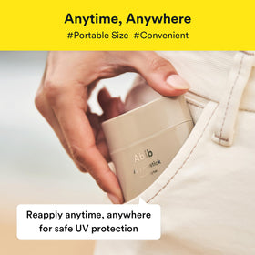 Abib Airy Sunstick SPF50+ in lifestyle setting outdoors