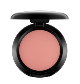 AcM Powder Blush Melba lifestyle scene with makeup tools
