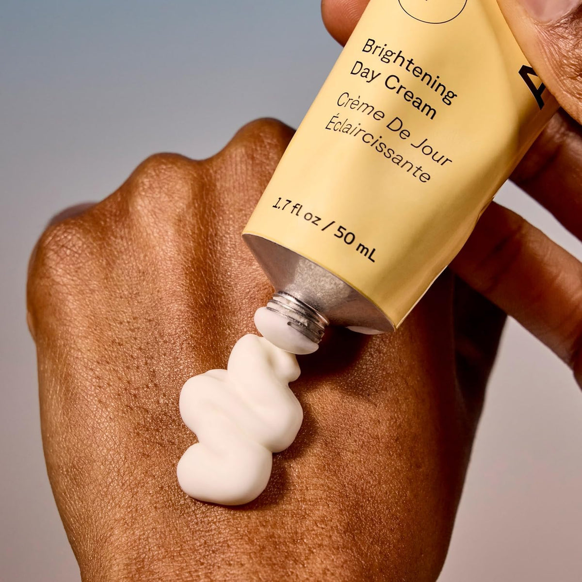 Acure Brightening Day Cream on a vanity