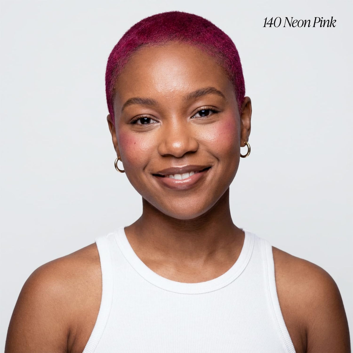 Adore Neon Pink hair dye bottle with label close-up