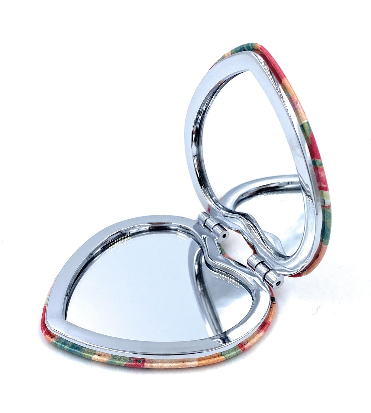 Aeisage Heart Shape Compact Mirror with floral print on a table