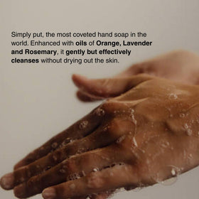 Aesop hand wash bottle with pump in a bathroom setting