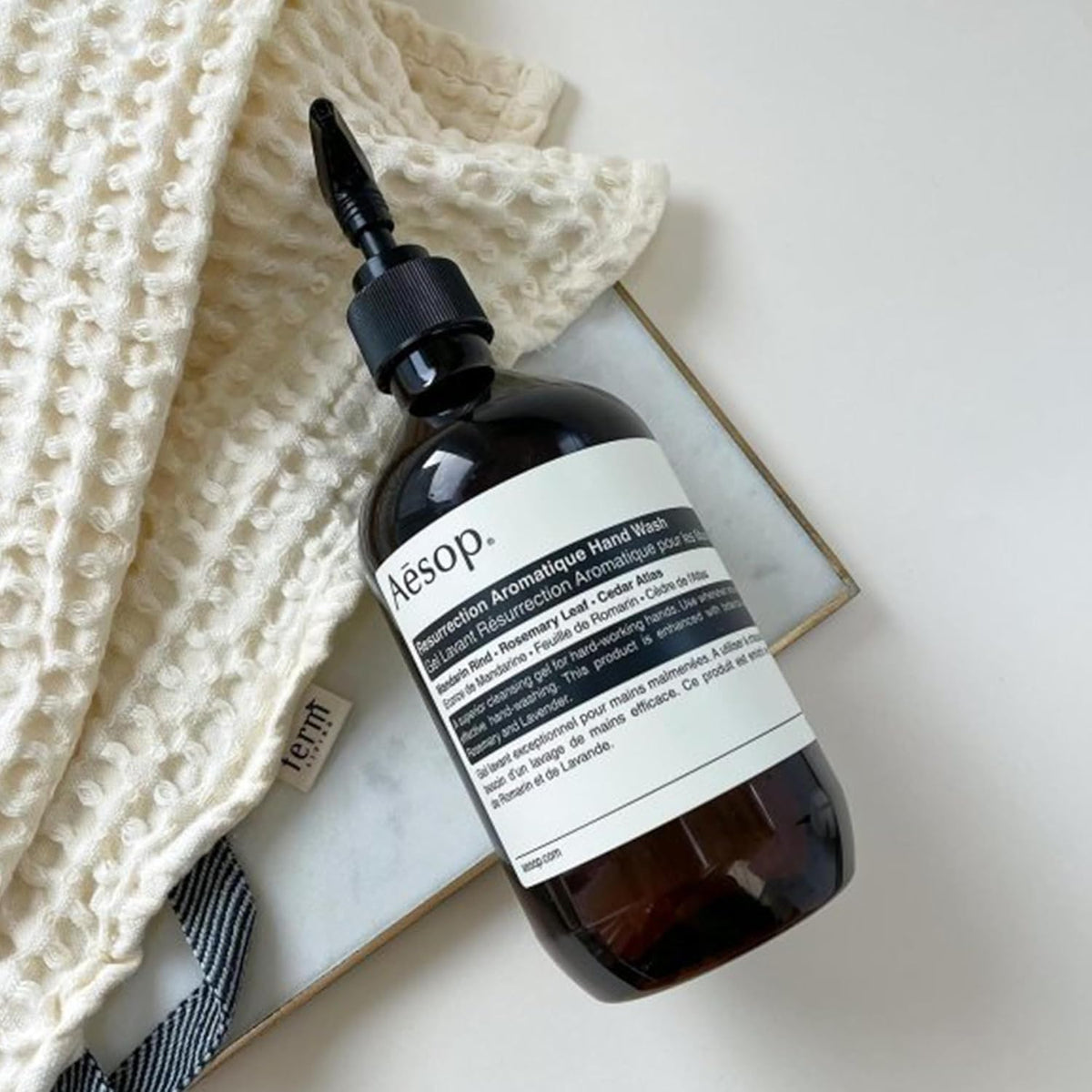 Aesop hand wash displayed with other Aesop products