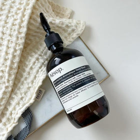 Aesop hand wash displayed with other Aesop products