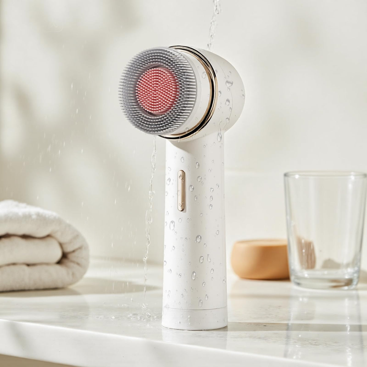 AFEIOFT Electric Facial Cleansing Brush on a bathroom counter with skincare products