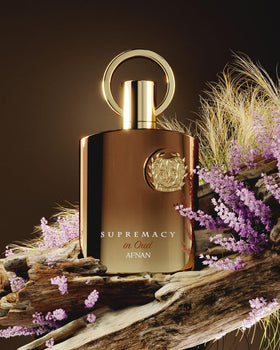 Afnan Supremacy in Oud Extrait De Parfum on a vanity table