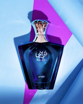 Afnan Turathi Blue Eau de Parfum Spray for Men on a vanity