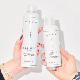 AIIR Texture Styling Spray in use on styled hair