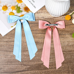 Aileam Silky Satin Hair Bows on a girl's hairstyle