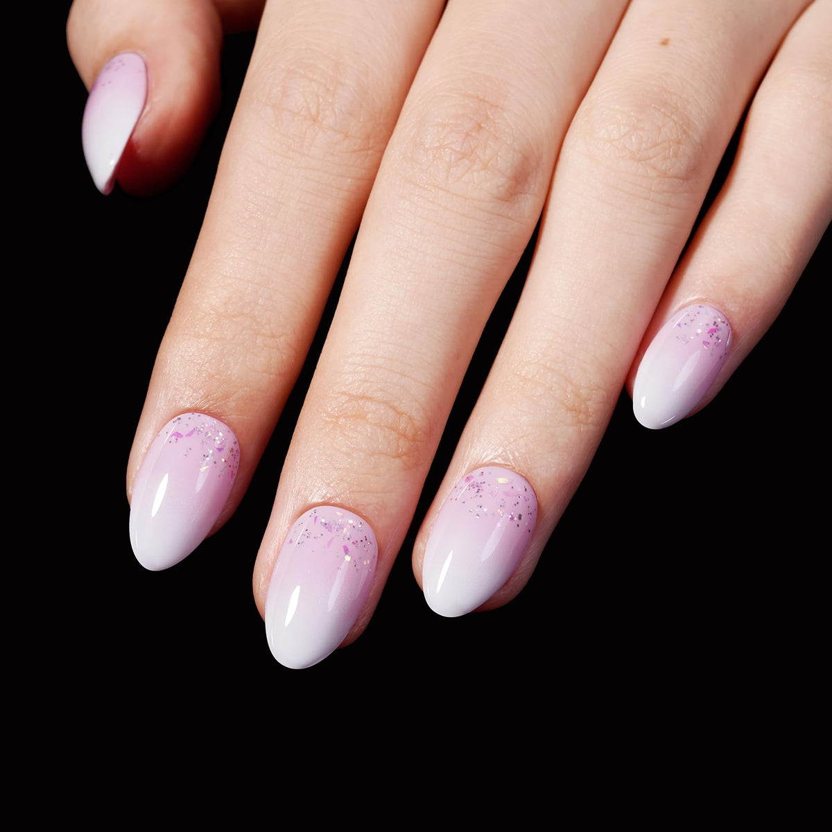 AILLSA nail tips displayed with nail polish