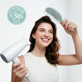 AIMIKE Detangler Hair Brush in a lifestyle scene with hair products
