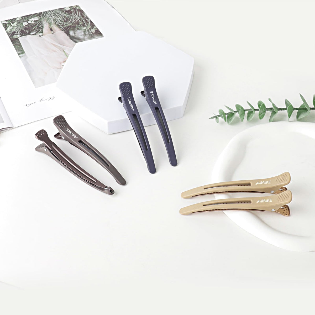 AIMIKE Hair Sectioning Clips in neutral colour on a table