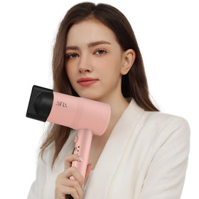 Aina Hair Dryer Babe Pink packaging on a flat surface