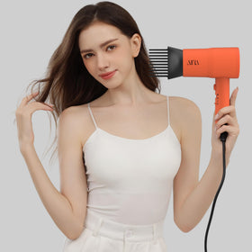 Aina Hair Dryer in use with volumising finger diffuser