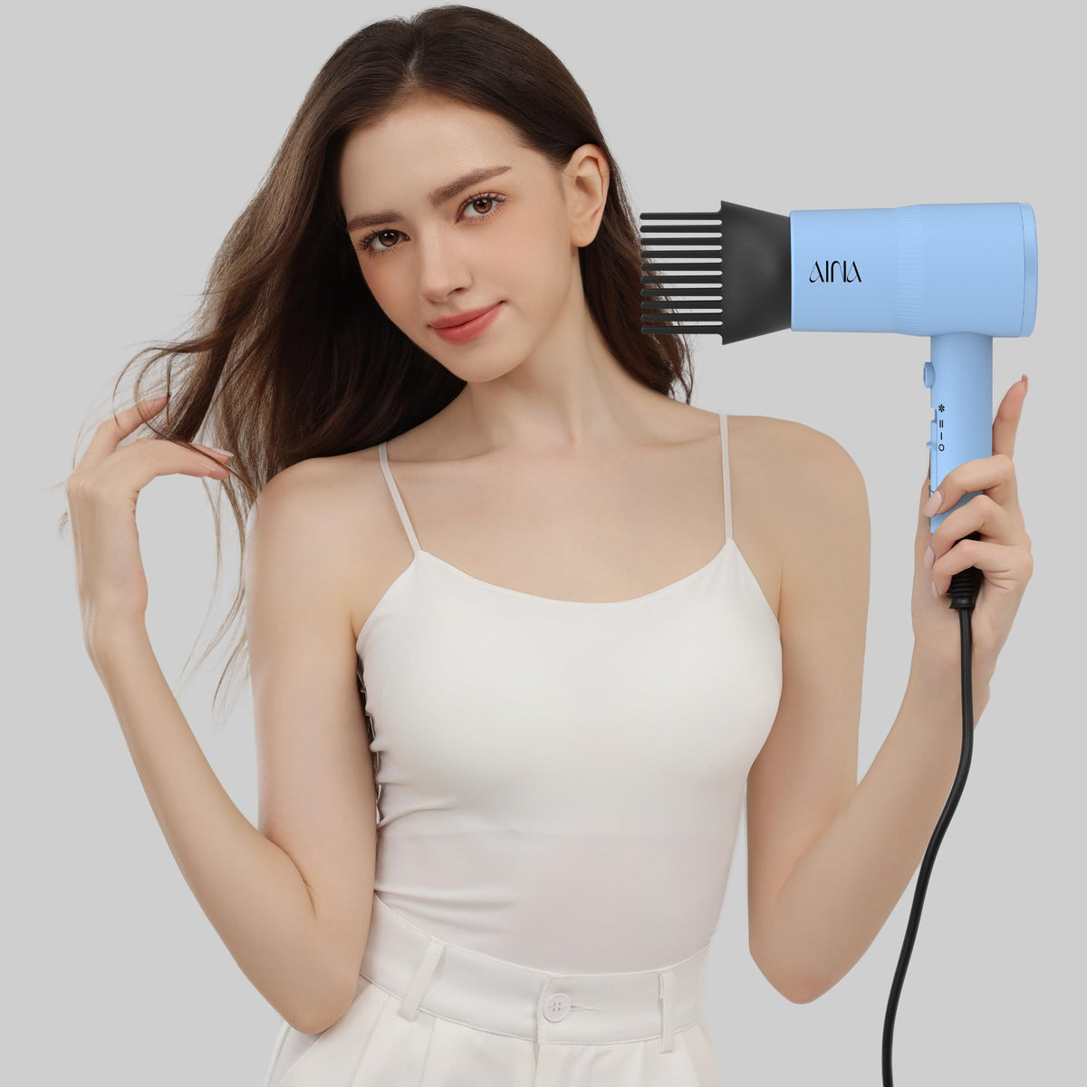 Aina Hair Dryer with comb attachment for styling