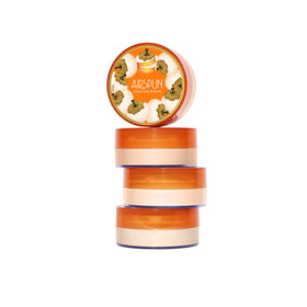 Airspun Loose Powder alongside makeup brushes