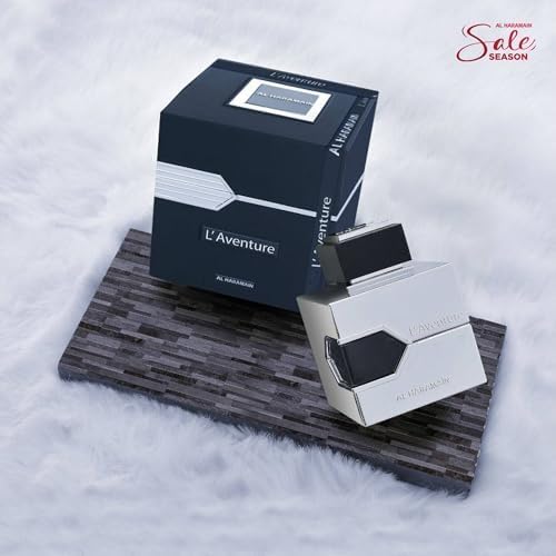 Al Haramain L'aventure Eau De Parfum Spray with flowers