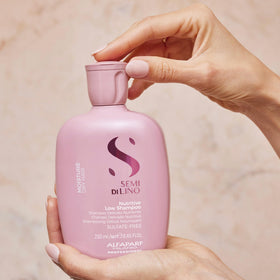 ALFAPARF MILANO Semi di Lino Moisturizing Shampoo in bathroom setting