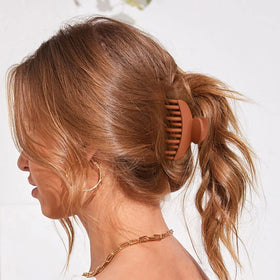 All four DEEKA Hair Claw Clips displayed together
