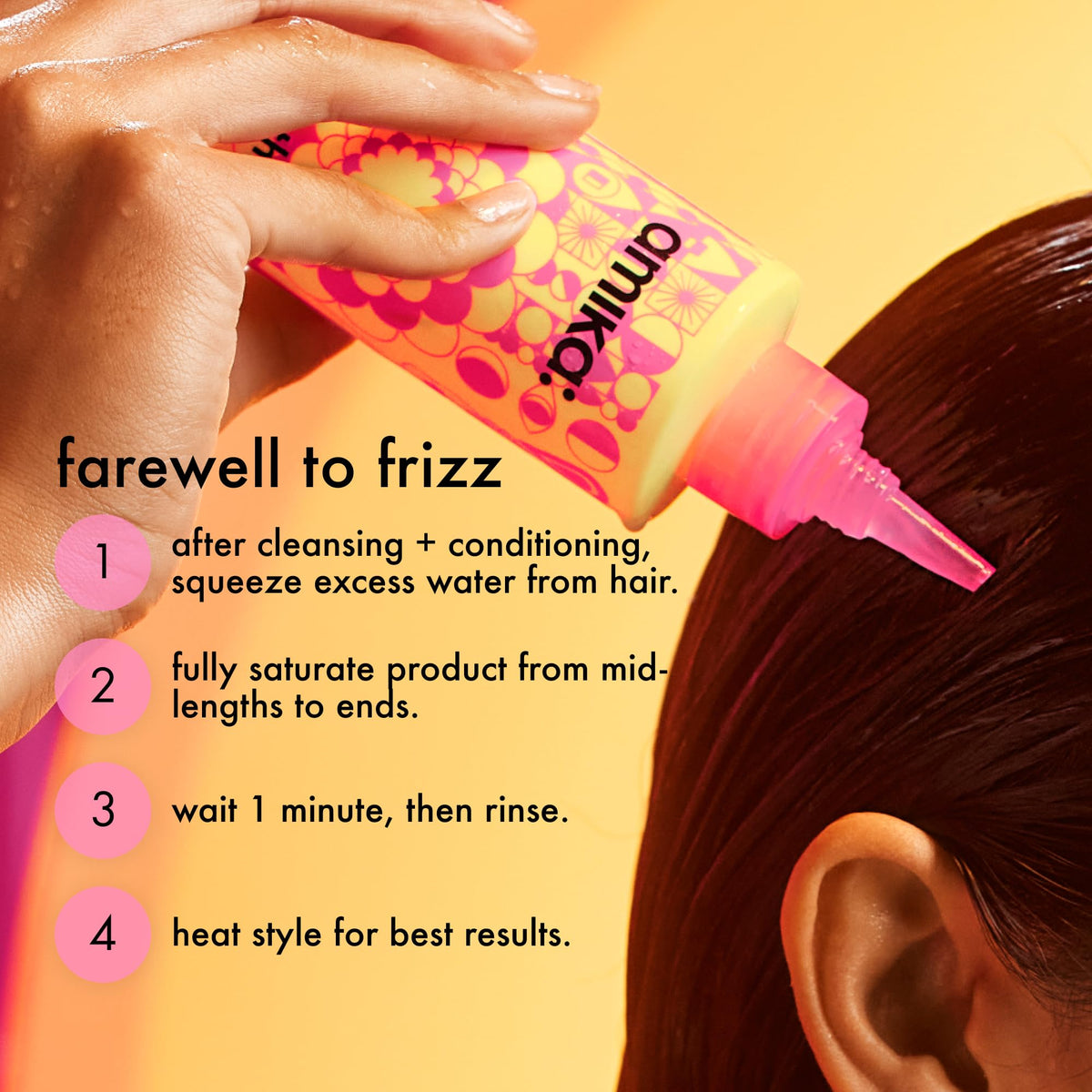Amika anti-frizz products arranged with fresh flowers