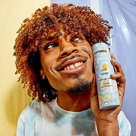 Amika Curl Corps Defining Cream with styling tools