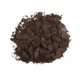 Anastasia Beverly Hills Brow Powder Duo on a makeup table with brushes