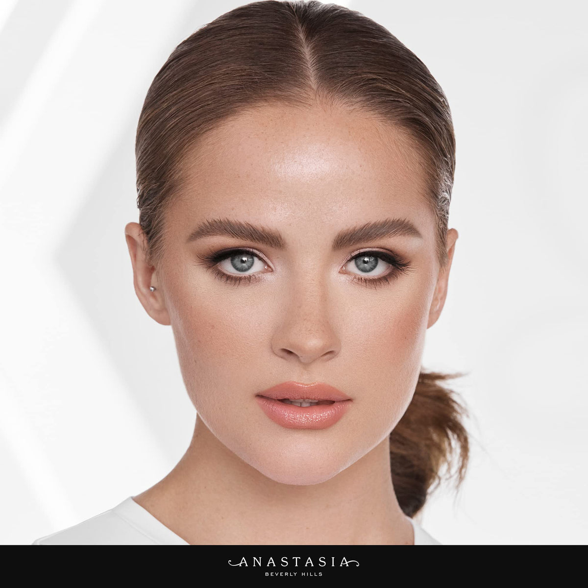 Anastasia Beverly Hills Brow Powder Duo packaging on a vanity