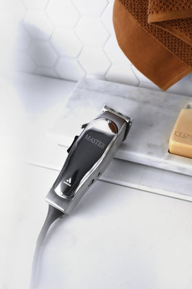 Andis Master Hair Clipper in use during a haircut