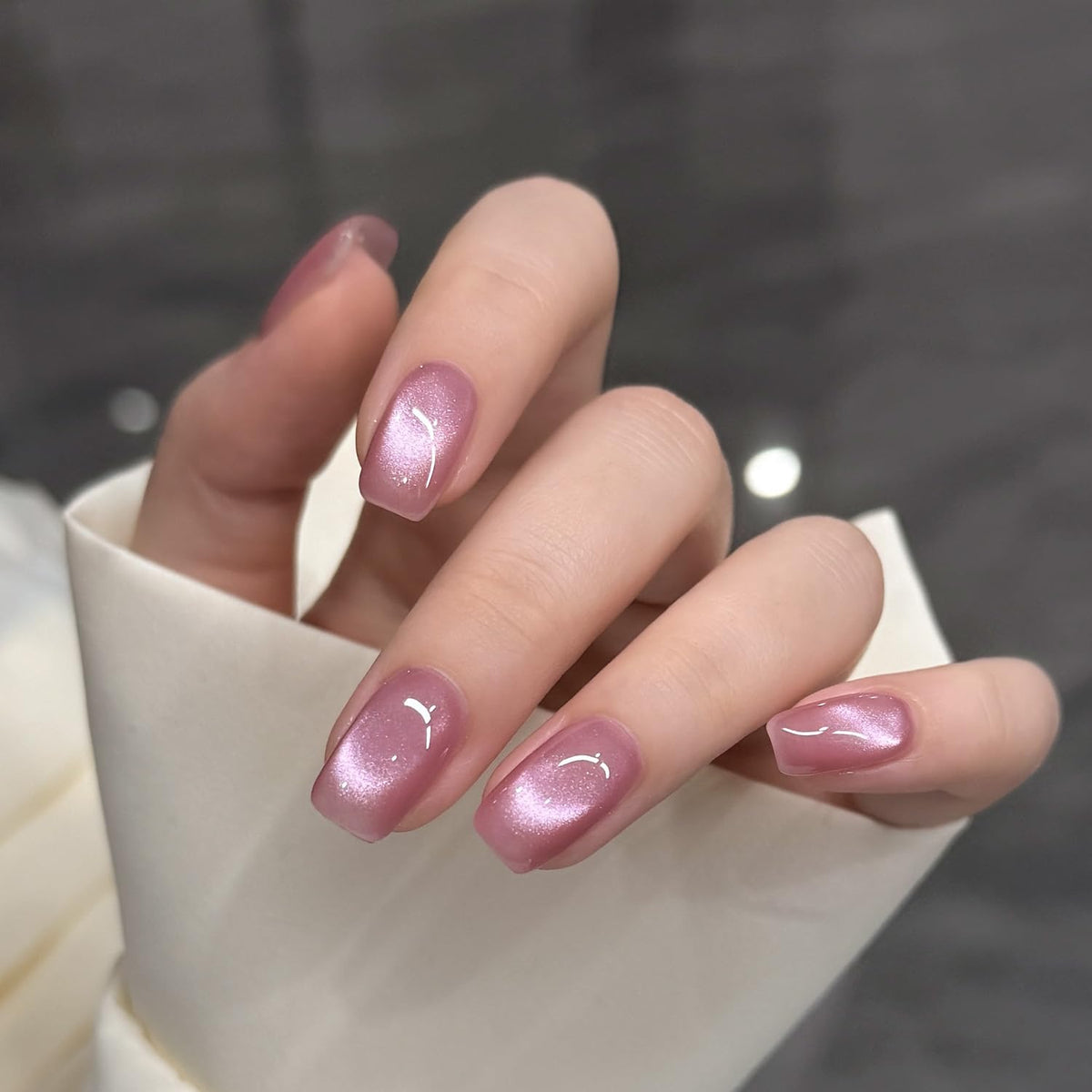 Application of GAOY Pink Glassy Cat Eye Gel Nail Polish on nails