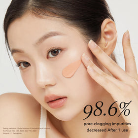 APRILSKIN Carrotene IPMP Clay Mask in a bathroom setting