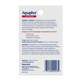 Aquaphor Lip Repair Ointment with a hand applying it to lips