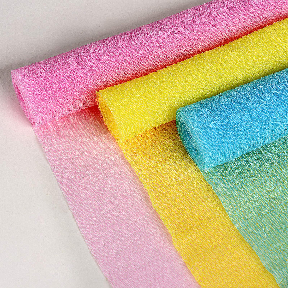 ARCH&M Exfoliating Shower Towels displayed together