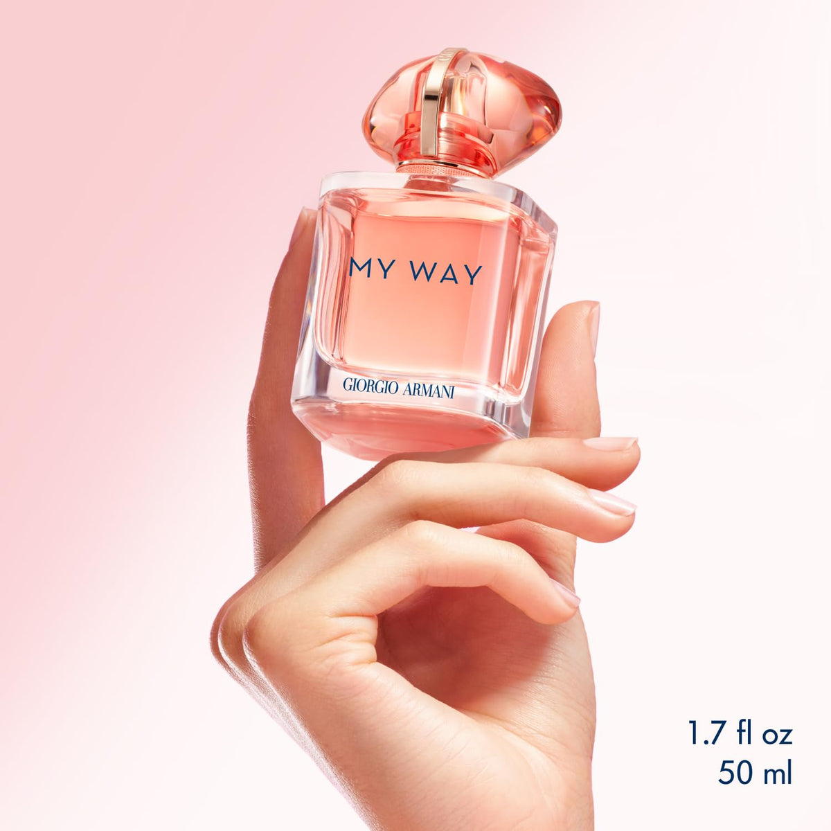 Armani Beauty My Way Ylang Eau de Parfum bottle with floral background