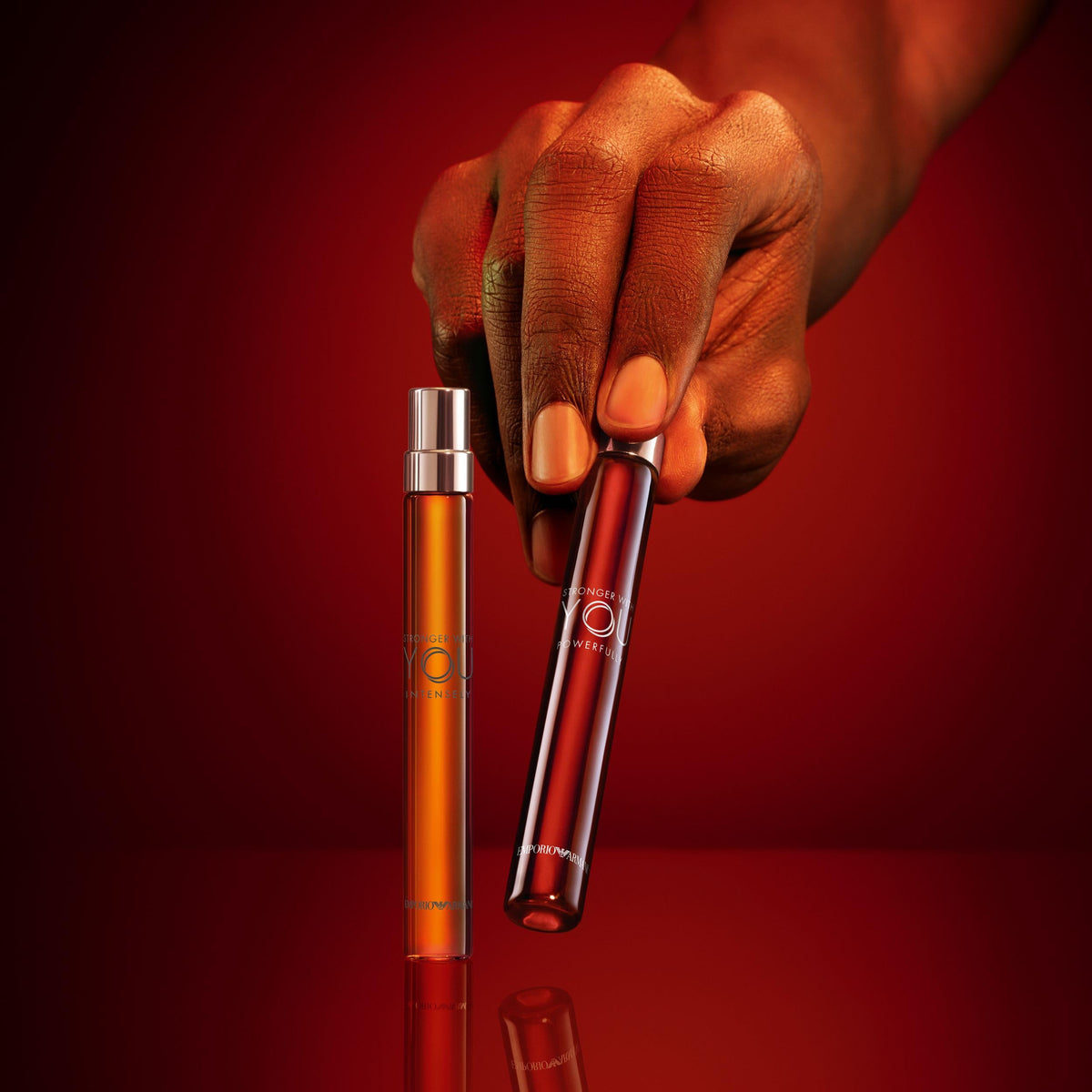 Armani Beauty Stronger With You Intensely cologne lifestyle shot with accessories