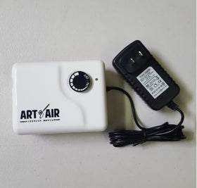 Art of Air airbrush kit components laid out
