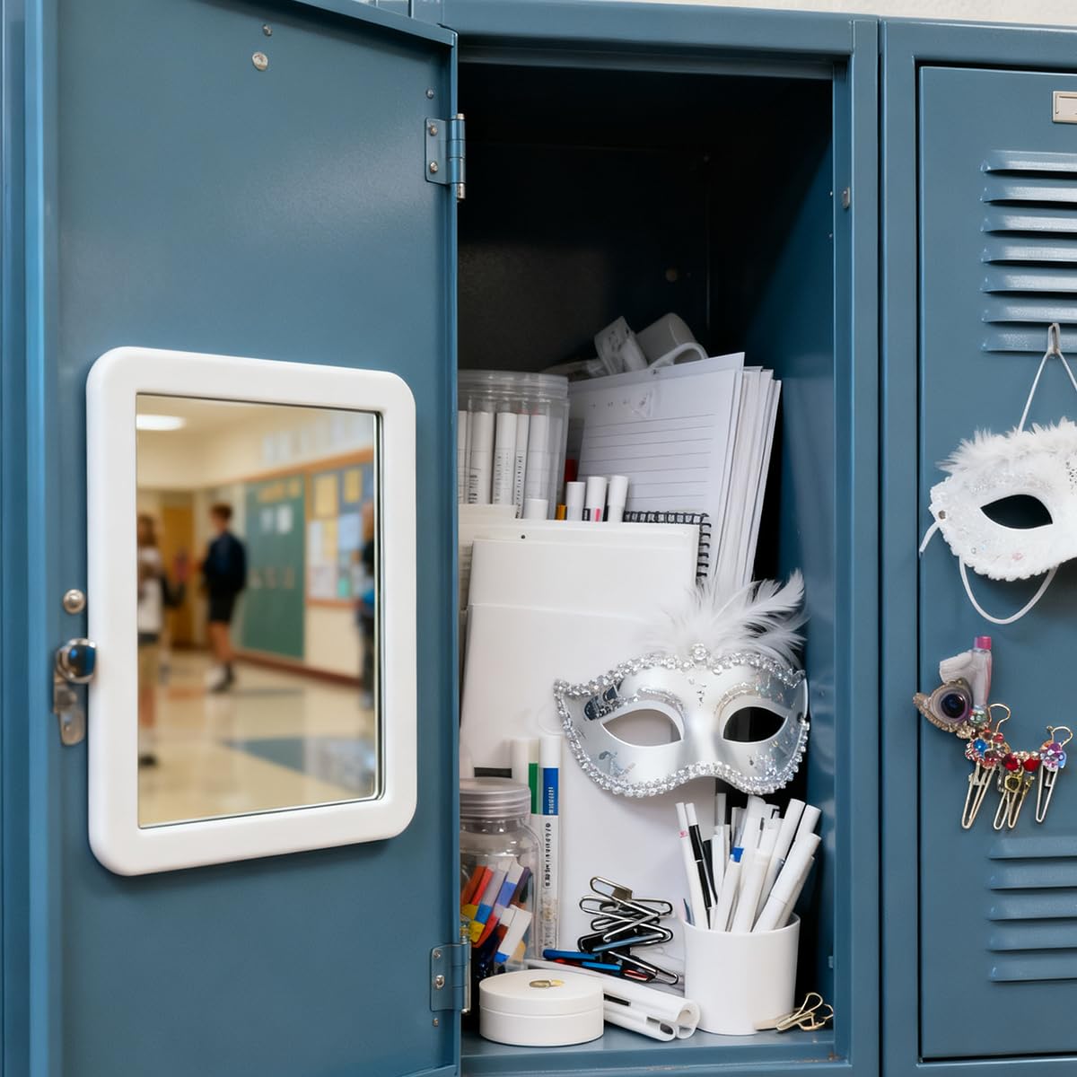 ARTLYMERS locker mirror being held in a hand