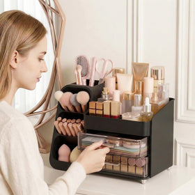 Asdbko makeup organizer showing brush holder and compartments