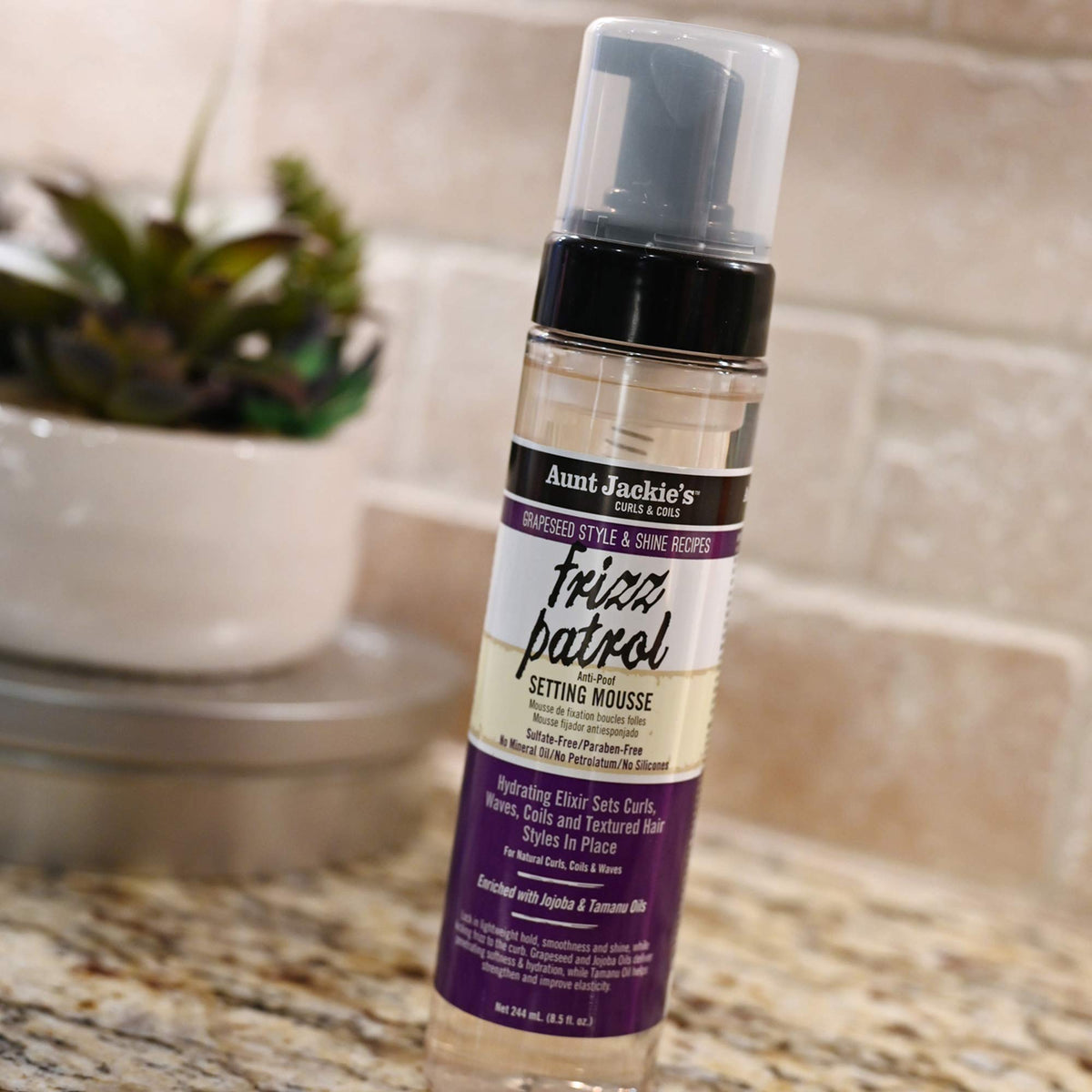 Aunt Jackie's Frizz Patrol Setting Mousse application on hair