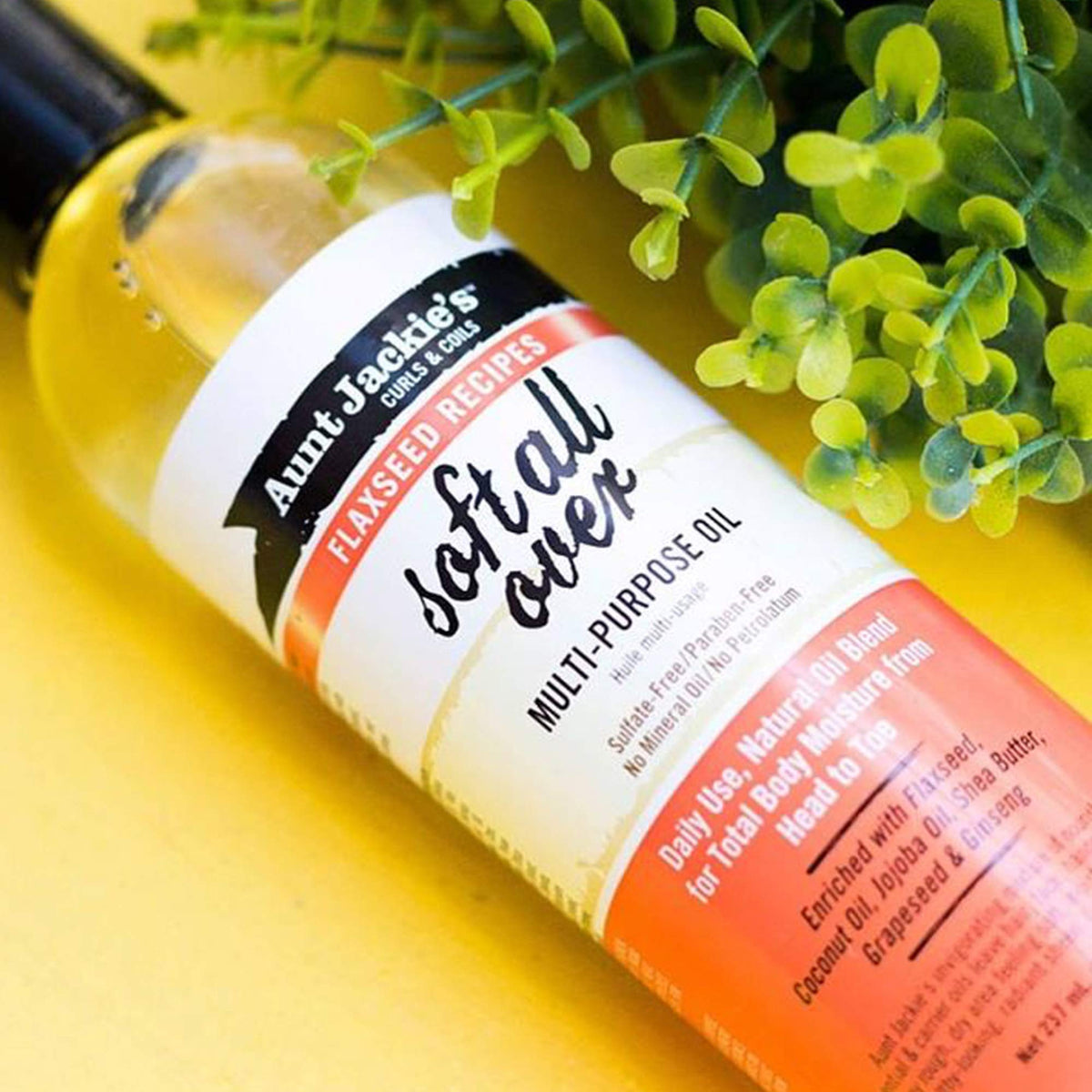 Aunt Jackie's Multi-Use Oil 8 Fl Oz with a dropper dispensing oil