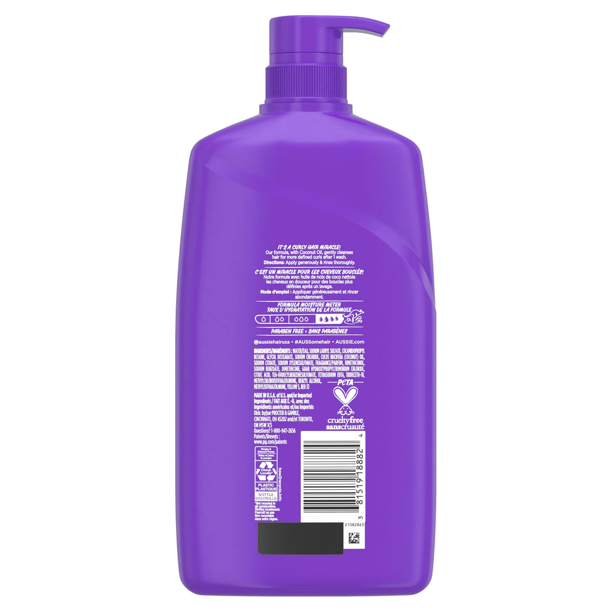 Aussie Miracle Curls Shampoo with citrus and floral background